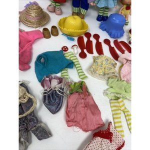 4 dolls with clothes and accessories